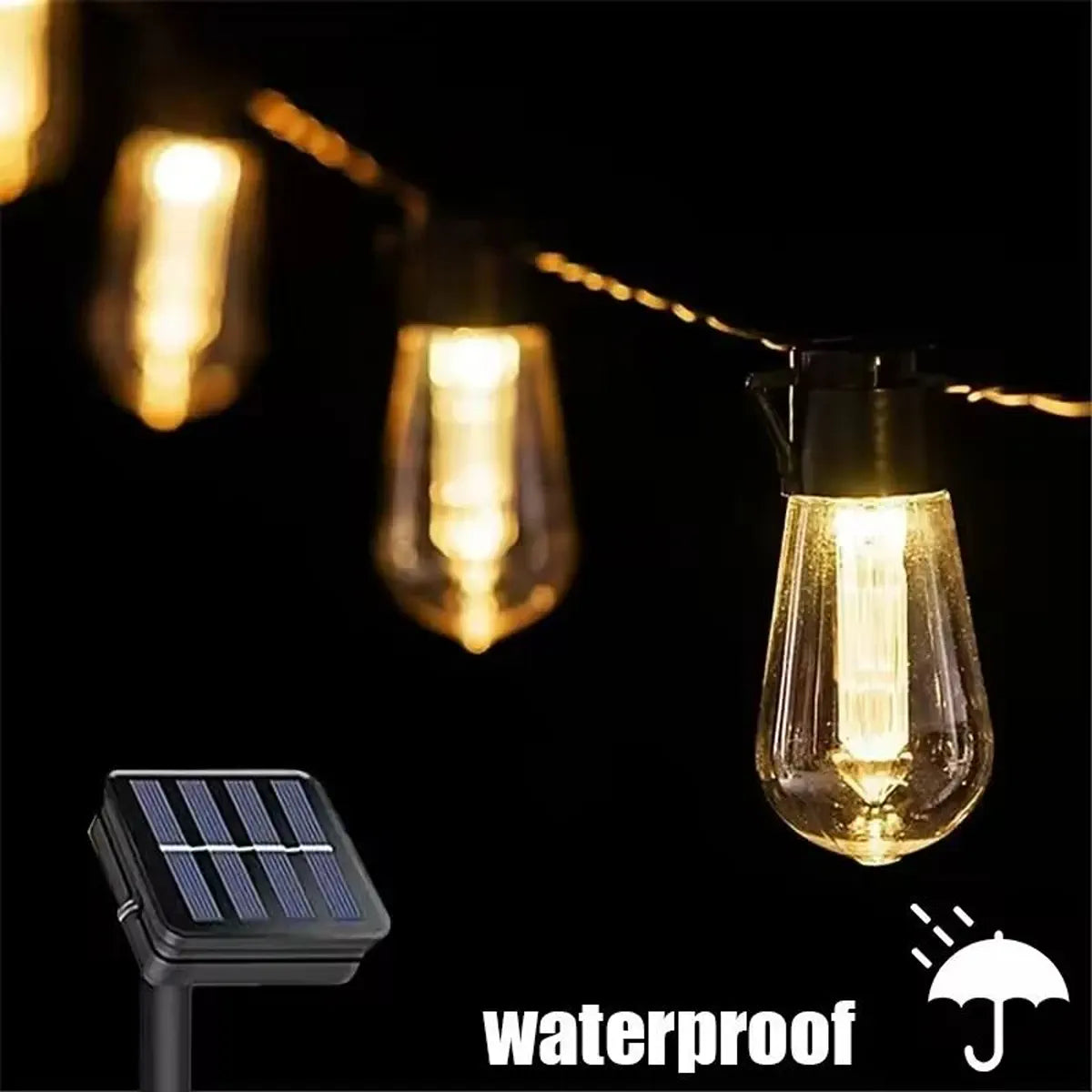 Warm bulbs and solar panel shown outdoors at night