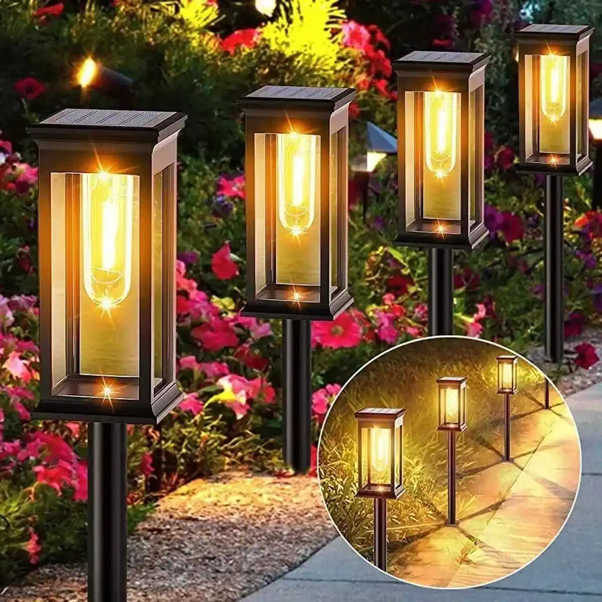 Solar lantern stakes lighting a garden border