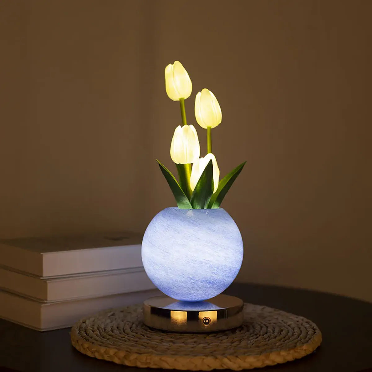 Blue tulip lamp with illuminated flower heads and globe