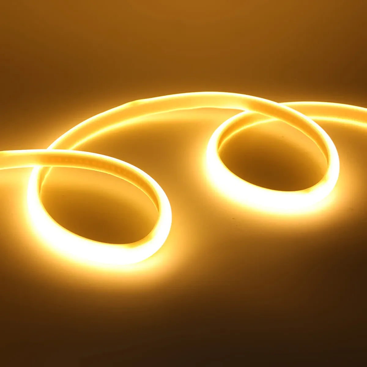 Warm COB neon strip arranged in glowing loops