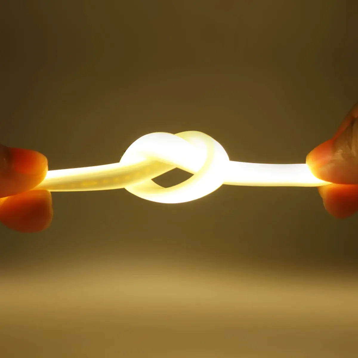 Warm COB neon strip tied into a flexible knot