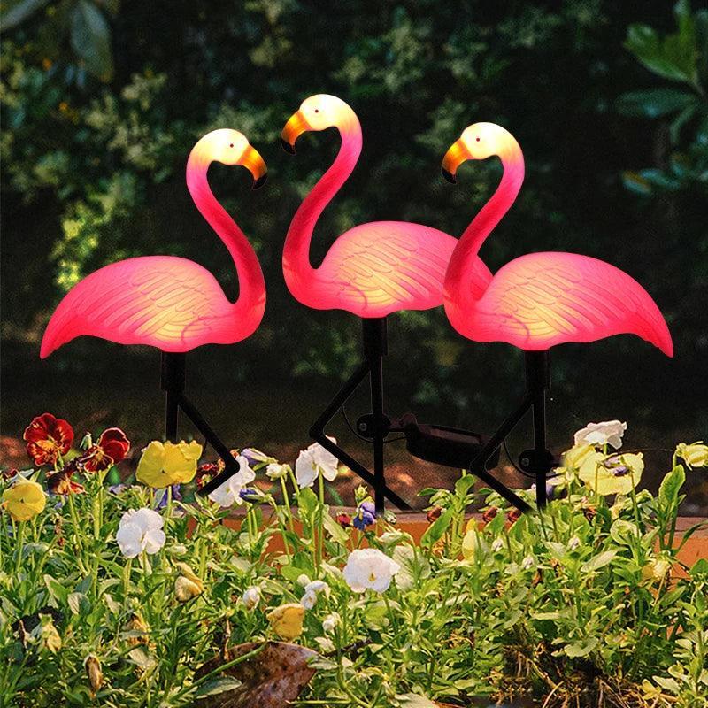 showcasing garden with Flamingo LED Solar Garden Stake Lights