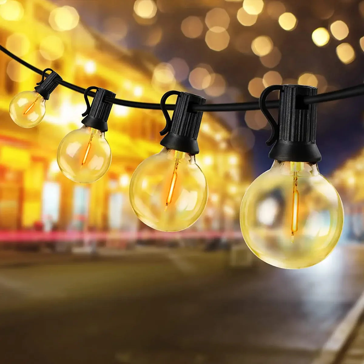 Close view of warm G40 bulbs on the string light cable
