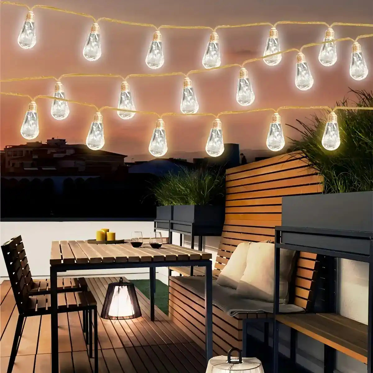 Warm teardrop lights on a garden trellis