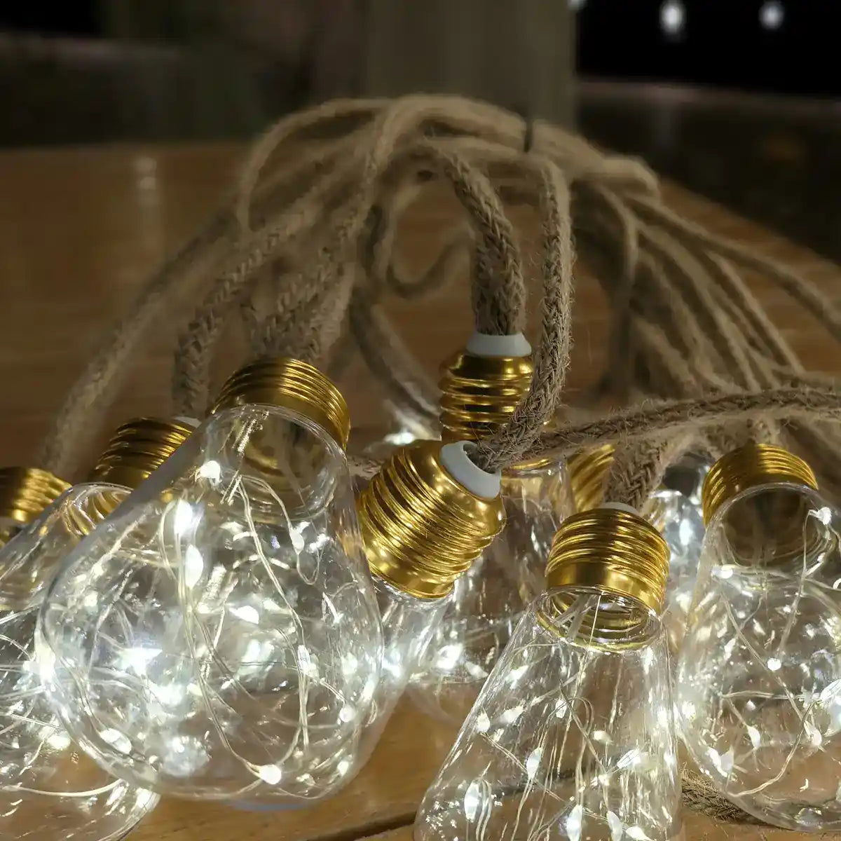Close-up of a clear teardrop bulb on a tree